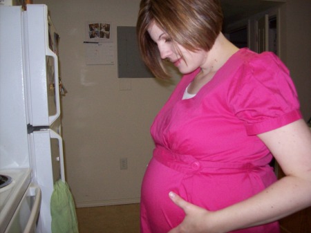 Me at 25 wks pregnant with our 1st Little Girl