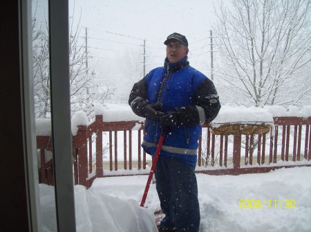 Terry shoveling our deck..heh, its Colorado!