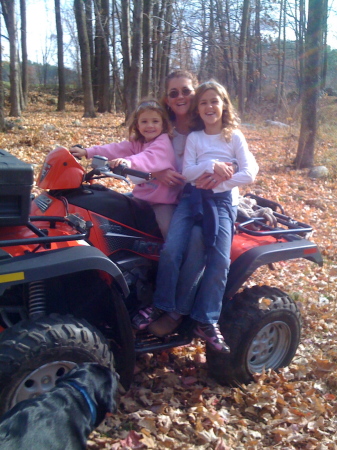 At Aunt Nicki's riding the 4 wheeler in Maine