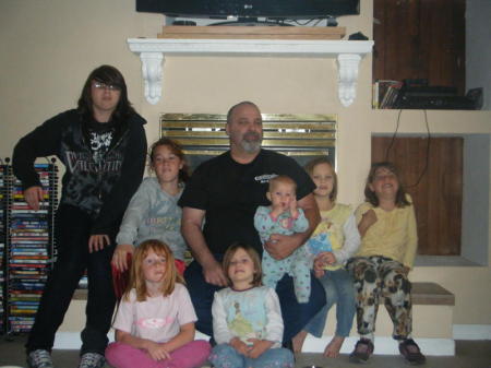 All my grandchildren with their grandfather.