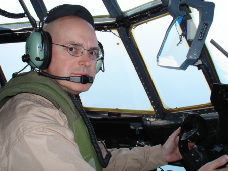 At the controls of a Marine KC-130