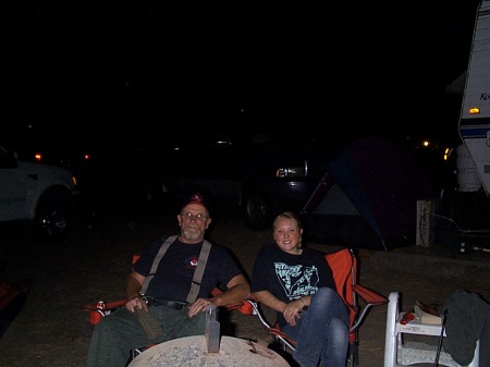 Katie and Grand Pa around campfire
