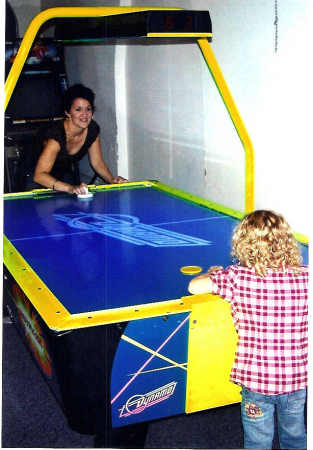 trying to beat my daughter in air hockey!