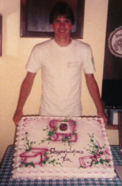 Tim with graduation cake