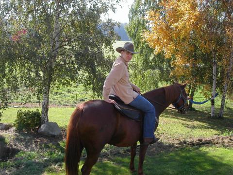 Rick Riding our horse River-Oct 2004