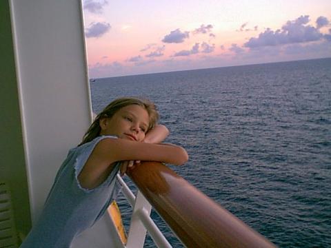 Daughter on ship balcony