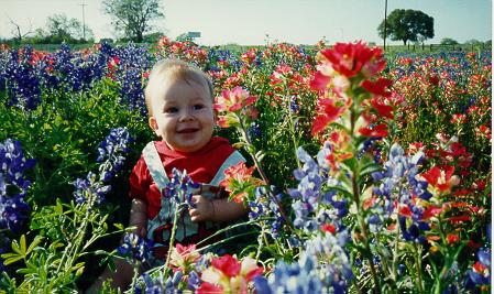 baby in flowers