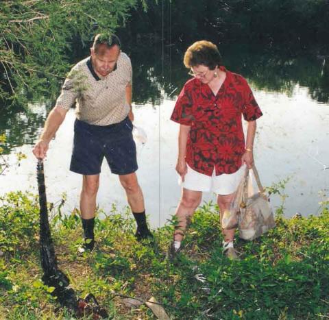 Judy Jolly and Chet With gator