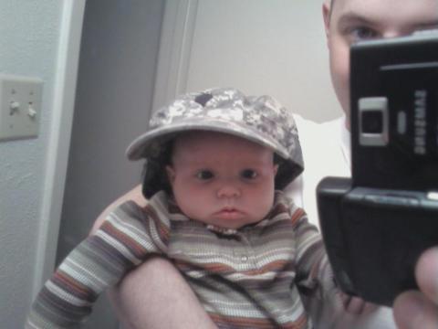 Aidan in daddy/s hat