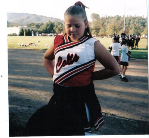 a picture of kim at her cheerleading game
