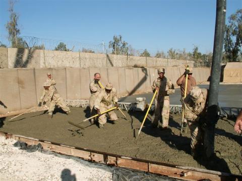 pouring concrete at Camp Sather, Baghdad