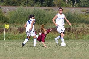 Leah playing soccer