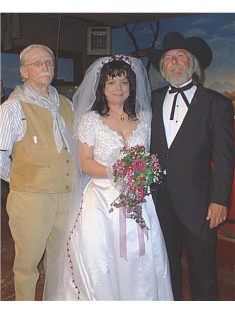 Dad and wedding couple