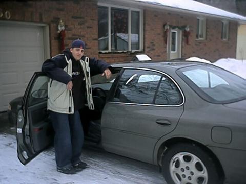 my son James and his car