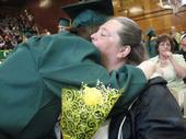 Katie honoring me with a flower at graduation