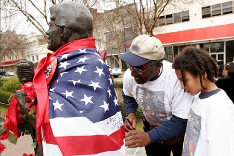 Frank & Morgan Signing Flag Draping James Brown Statue