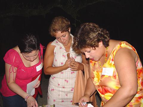 Volunteers Ivette and Iliana w/ Marisol