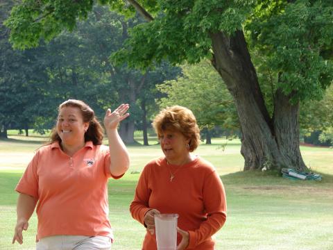 Amy & Lisa working golf outing