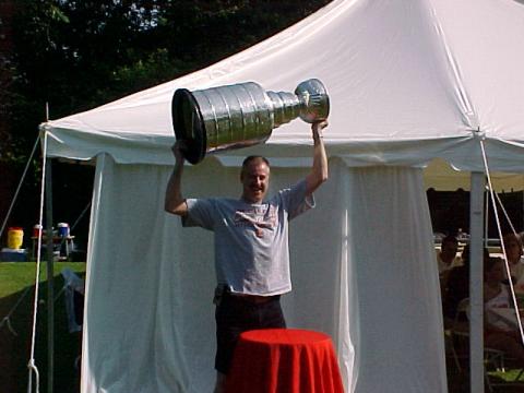 Mike holding cup 7/02/2002