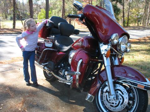 my new harley and grandaughter