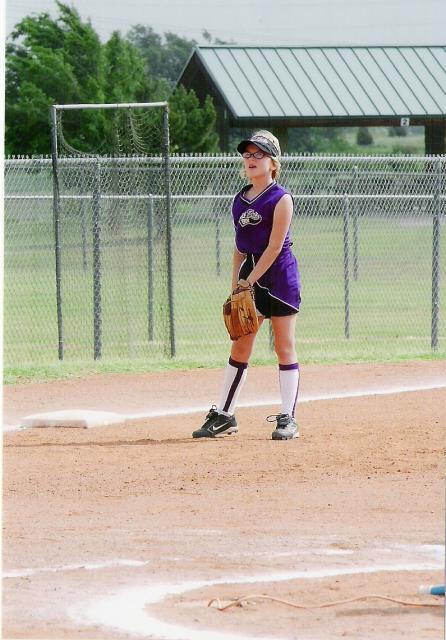 Katie playing softball