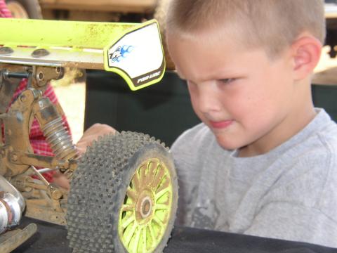 Thomas working hard on his RC car