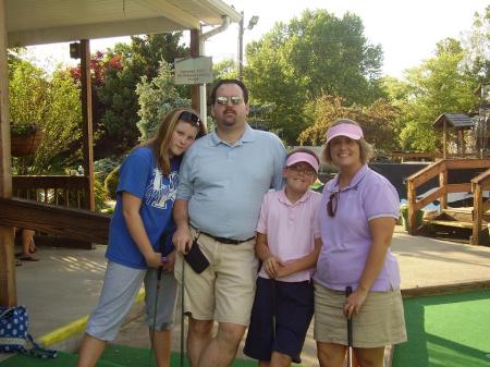 The Family playing putt putt