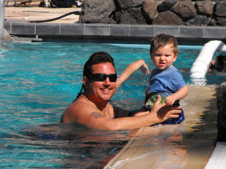 ME AND MY SON NICKOLAS POOLSIDE IN WAIKIKI