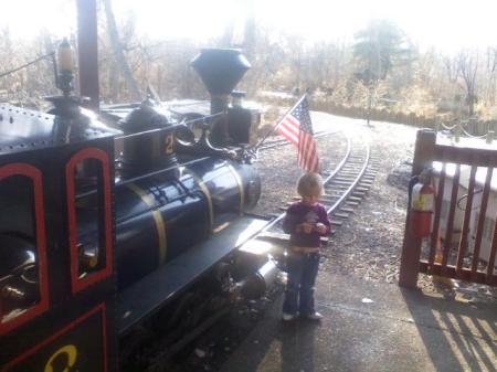 Kayla next to the zoo train engine