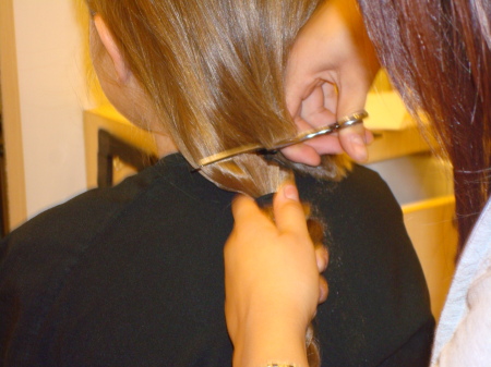 Lauren cutting her hair for locks of love