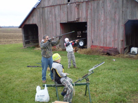 Boys with Uncle Dale shooting Skeet at nana's
