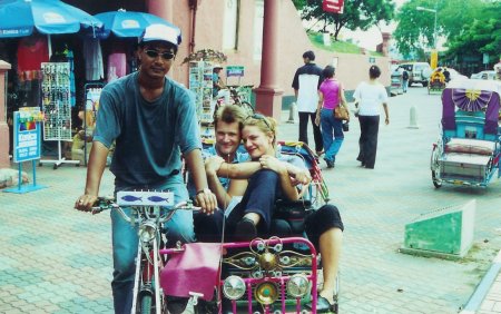 On a rickshaw in Malaysia