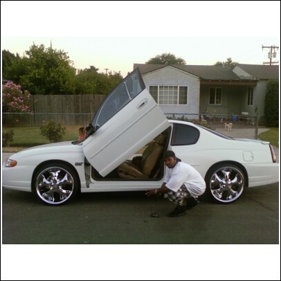 HAVE U EVER SEEN A CHEVY WIT DA BUTTERFLY DOOR