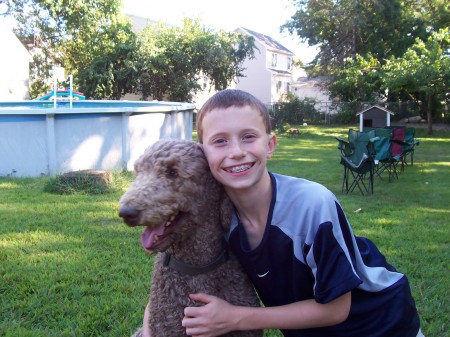 Zachary and Aniken our standard poodle 9/1/07.