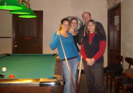 Our Family playing pool.