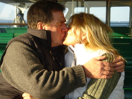 Dzintra kissing husband Allen in Seattle, WA
