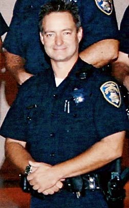 Officer Nels "Dan" Niemi Badge #298
