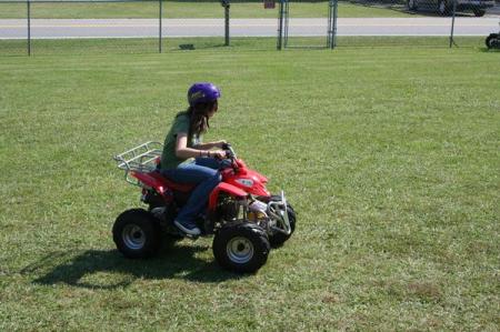 jess on britany and sydney's 4 wheeler