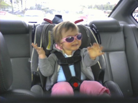 Carrie being a cool kid in the car