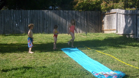 My new backyard and the kids playing.....