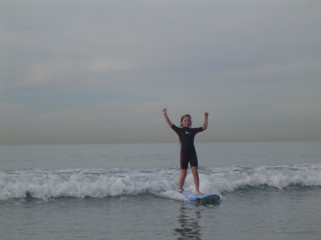 Emmalee surfing.