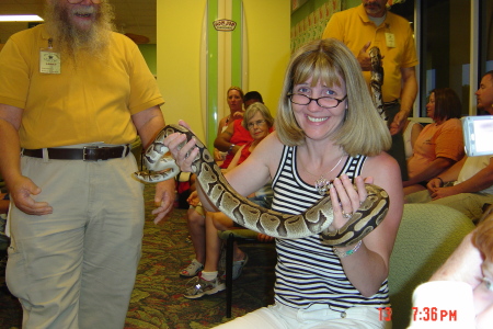 Me holding a snake on vacation in Florida