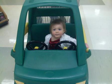 my baby,Carrie in a shopping cart