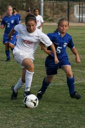Jaylene playing soccer