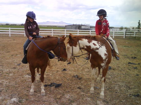 Abbey and Aspen sitting on their gay horses