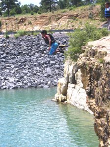 Noah jumping 40 foot cliff at Heron Lake