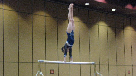 Teghan on the high bar