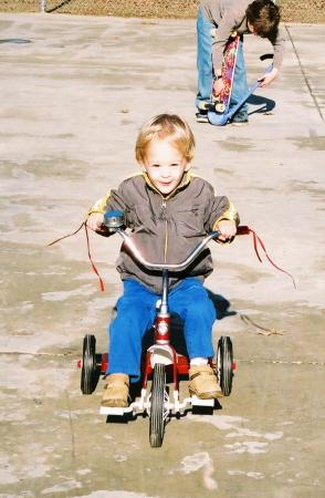 C.J. on his new tricycle