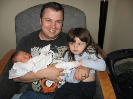 Son-in-law John holding Emma and Christy