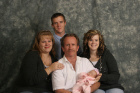 my hubby with his kids and our baby
